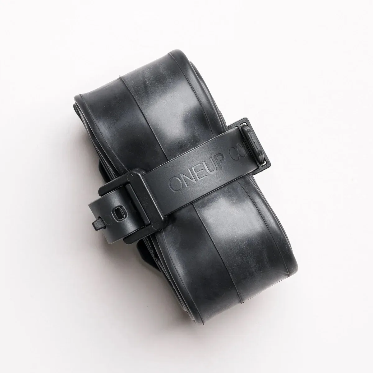 ONE UP COMPONENTS Tube Strap Mount ONE UP COMPONENTS Tube Strap Mount