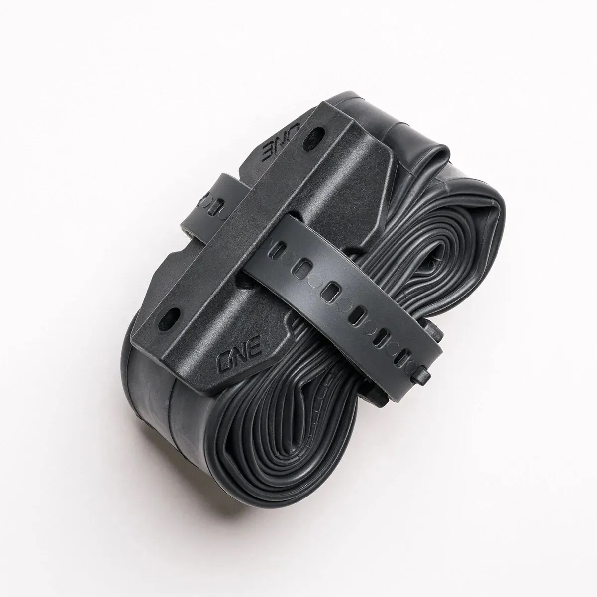 ONE UP COMPONENTS Tube Strap Mount ONE UP COMPONENTS Tube Strap Mount